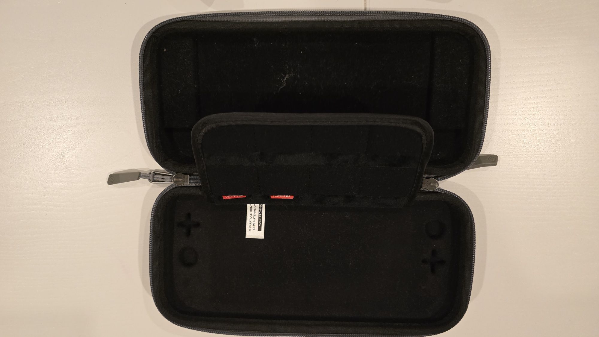 Nintendo switch +  bolsa de transporte + 1 jogo