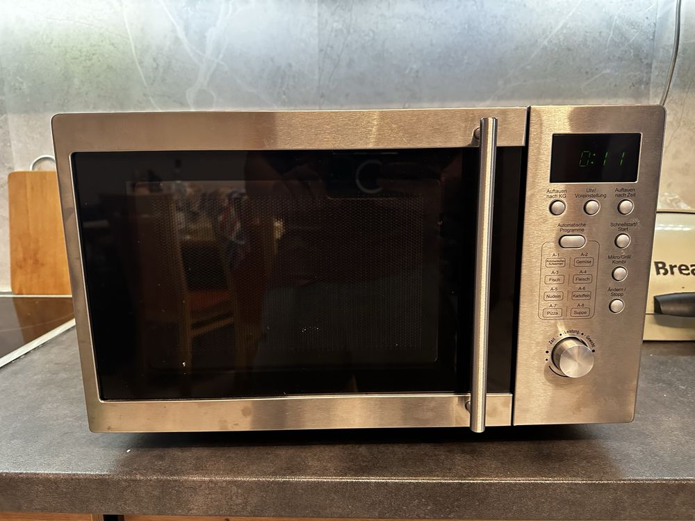 Exquisit microwave w. Grill UMW 800G-3 Inox