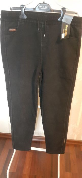 НОВІ з біркою штани на флісі 56 розмір. Колір чорний