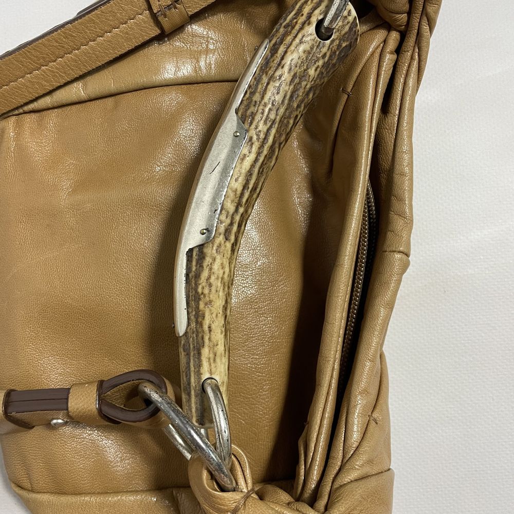 Oryginalna Yves Saint Laurent torebka skórzana z kością luksusowa