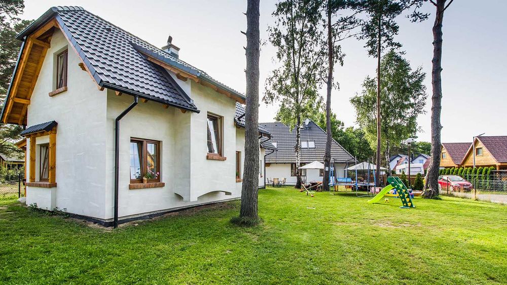 Domki nad morzem jacuzzi wakacje morze Jarosławiec plaża Dubaj las