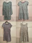 4 sukienki dla dziewczynki w rozmiarze 122/128 H&M i Smyk