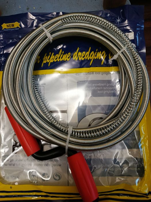 Трос для чищення труб сантехніка