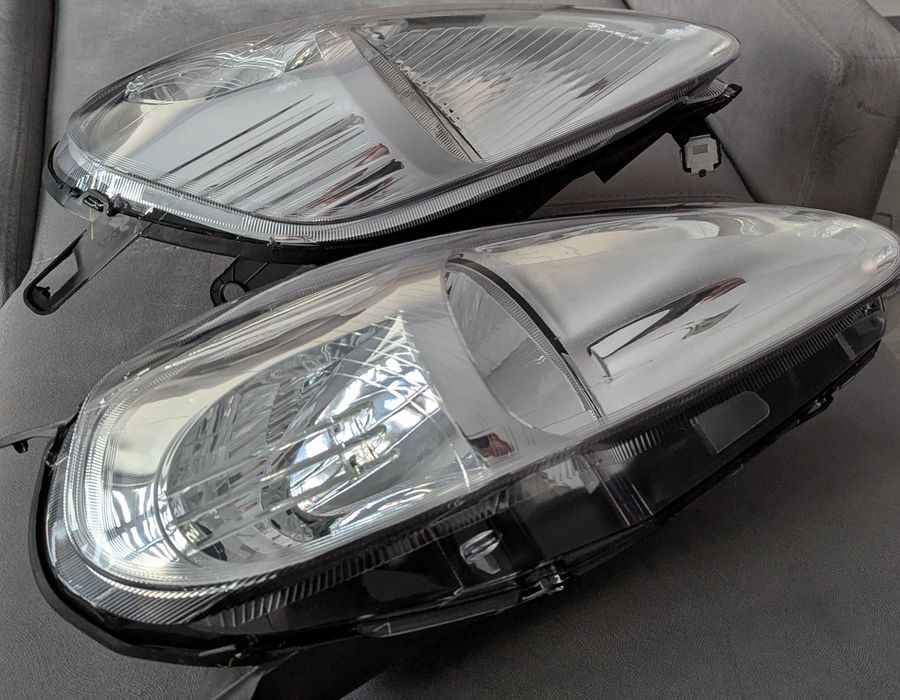Reflektory lampy światła przednie L+P Fiat Grande Punto - NOWE