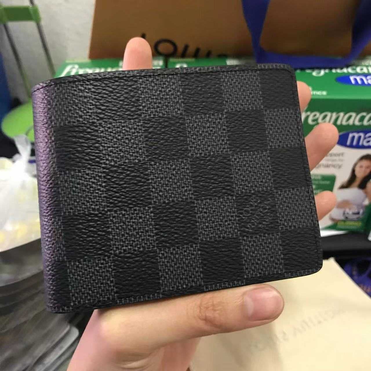 Portmonetka Louis Vuitton w kolorze czarnym, wzorzysta
