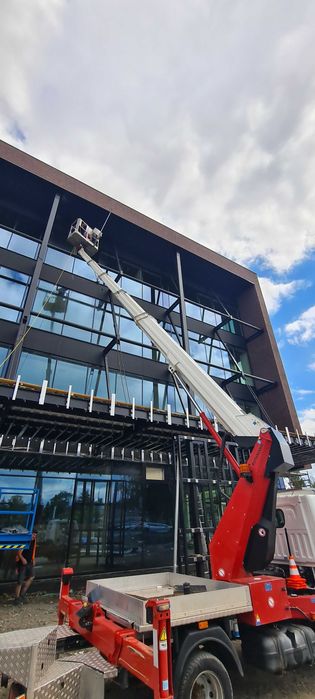 Podnośnik koszowy wynajem  usługi  zwyżka mycie okien