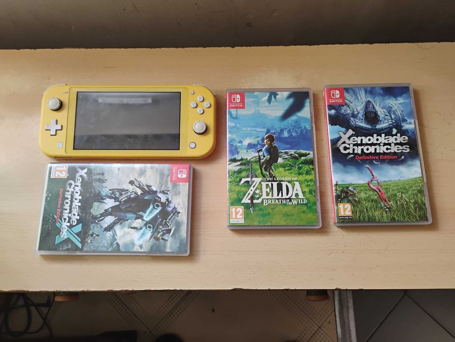 Nintendo Switch lite żółty + gry