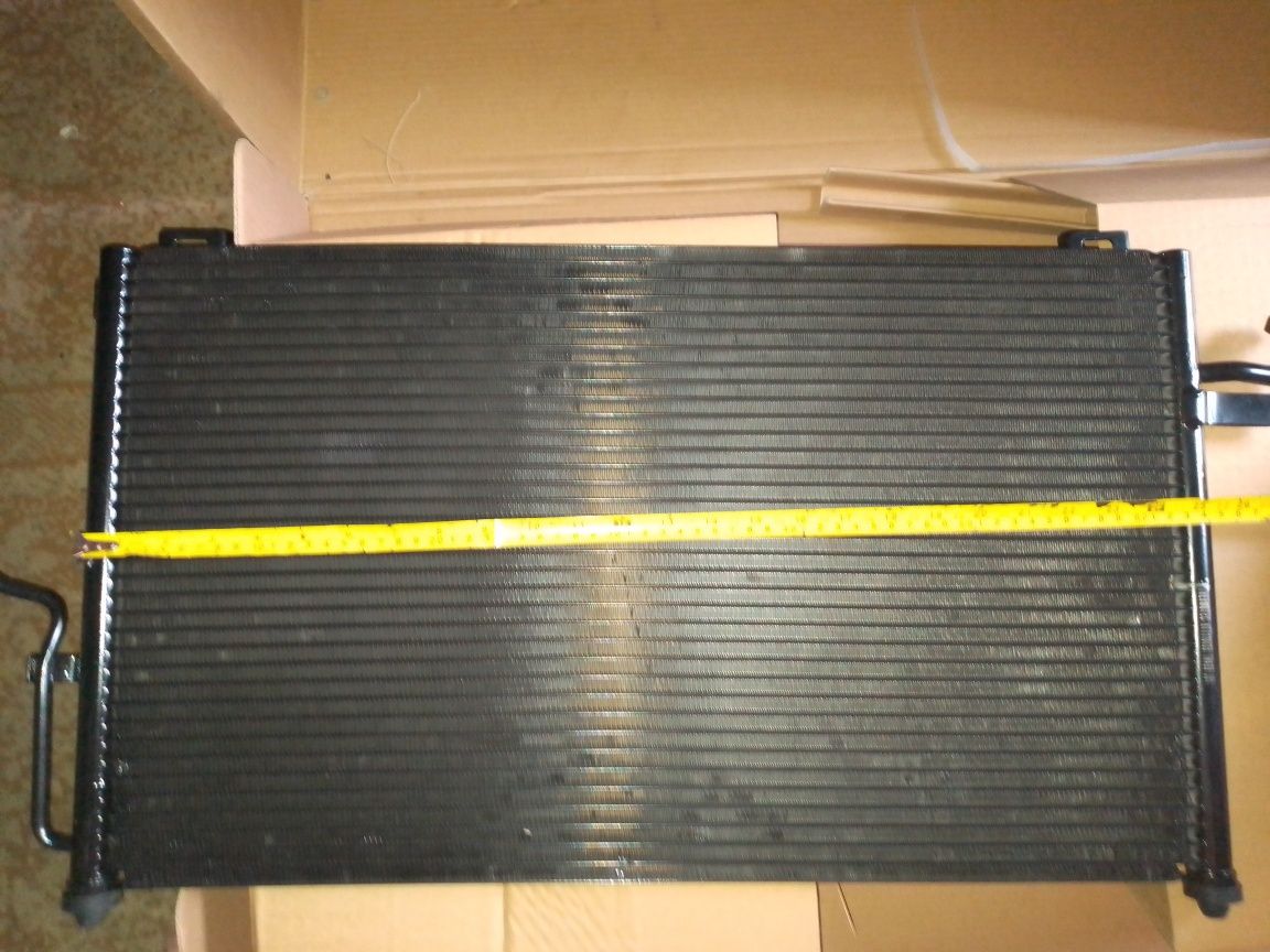 Продам радиатор кондиционера на Мазда 323 новый