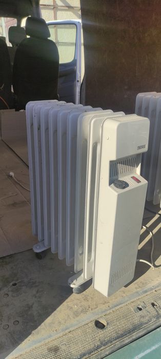 Масляні обігрівачі