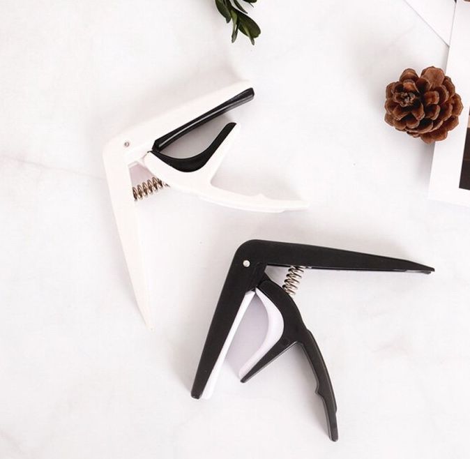 Каподастр (пластик) (гитара, электро-, укулеле) (Видеообзор) зажим