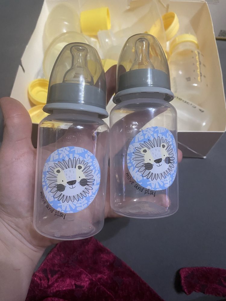 Laktator Medela z butelką magiczną oraz przyjemne gratisy