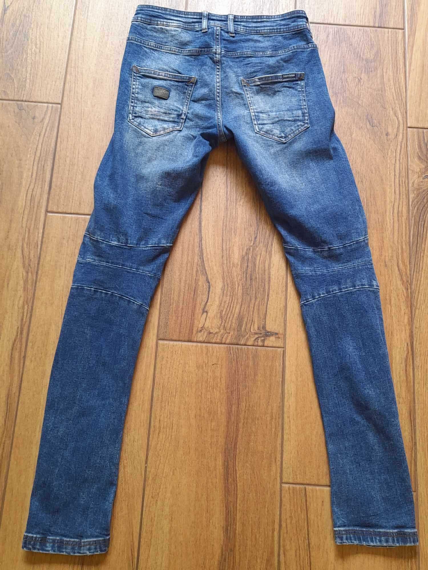 Spodnie młodzieżowe CROPP typ slim, granatowe, size 28/32 stan idealny