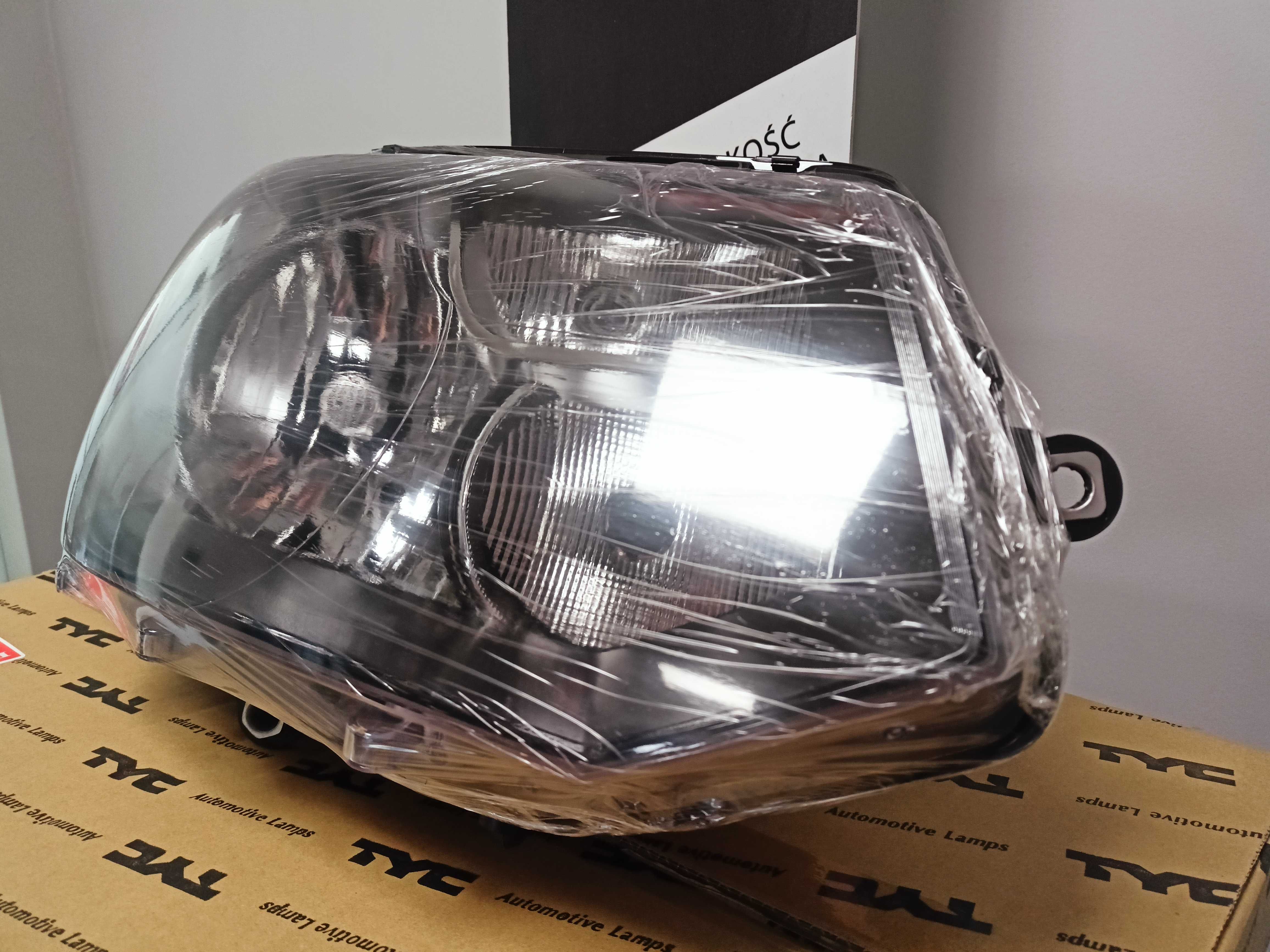 Vw transporter T5 09- Lampa/Reflektor Prawy /H4/ kpl.H4 GRATIS