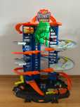 Hot Wheels City Mega Garaż Atak Dinozaura T-Rex