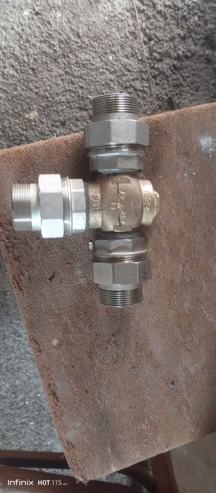 Продам триходовий термостатичний клапан з амереканками новий