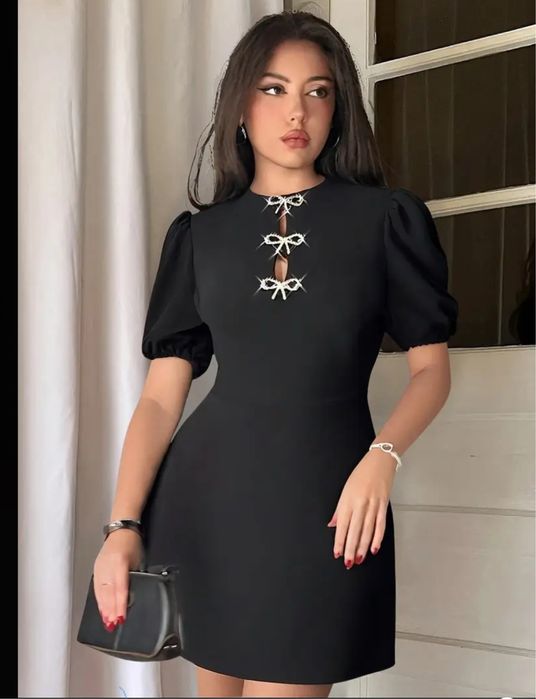 Сукня чорна з бантиками