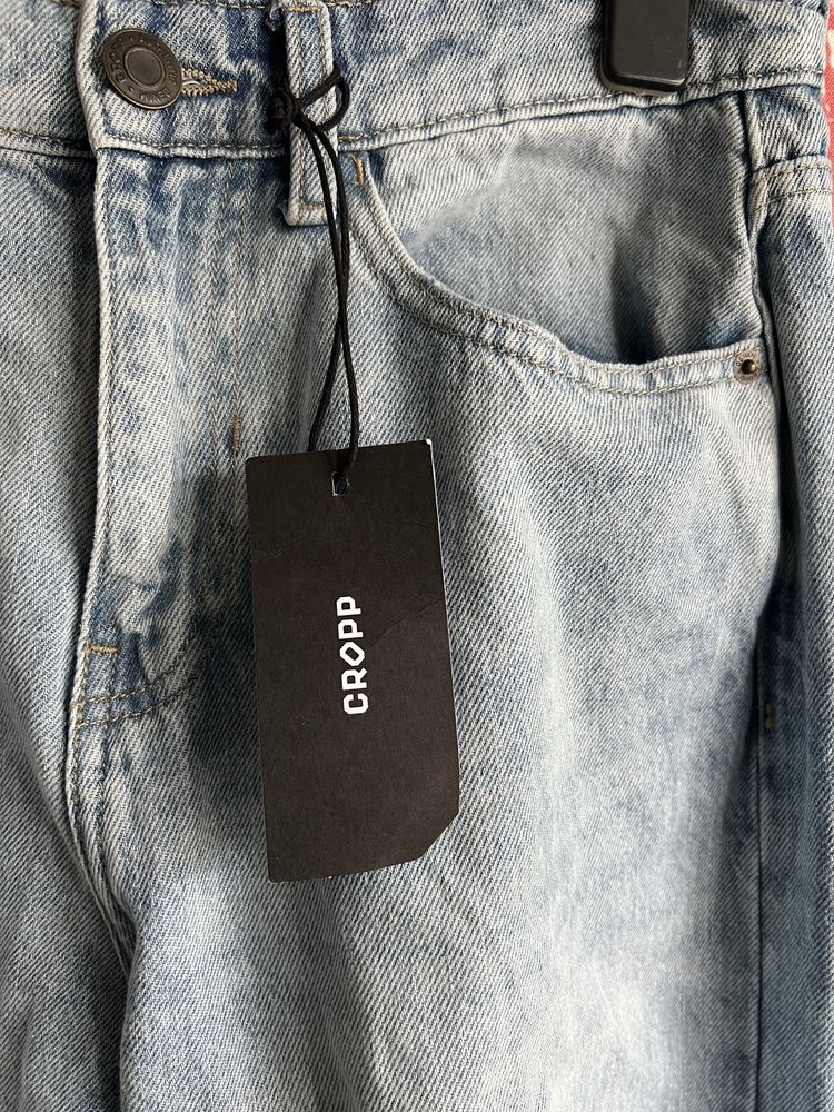 Spodnie jeansowe z dziurami przetarciami denimowe jeansy baggy Cropp