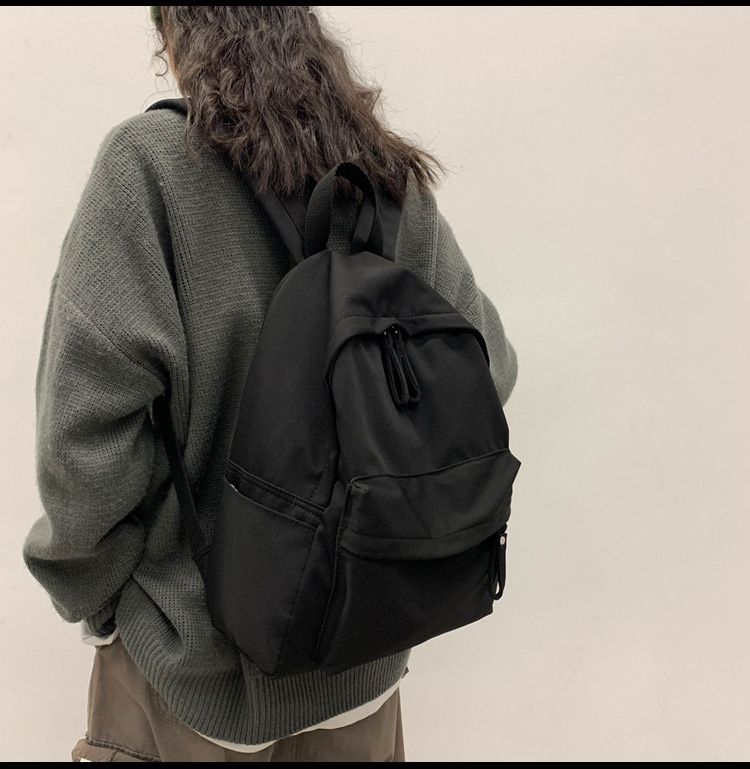 Рюкзак шкільний молодіжний міський чорного та стнього коліру.