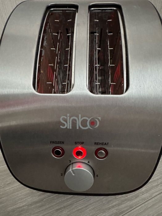 Тостер  sinbo є розморозка.