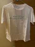 Tshirt branca com pormenores brilhantes