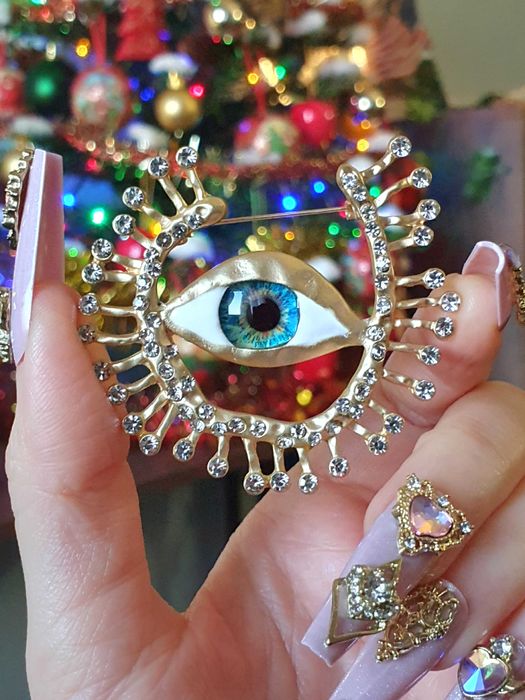 Broche pregadeira alfinete surrealista olho colorido dourado satinado
