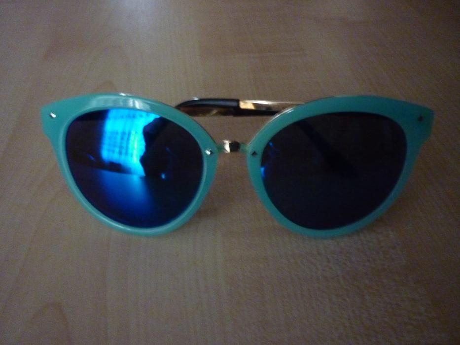 Солнцезащитные очки Louis Berry