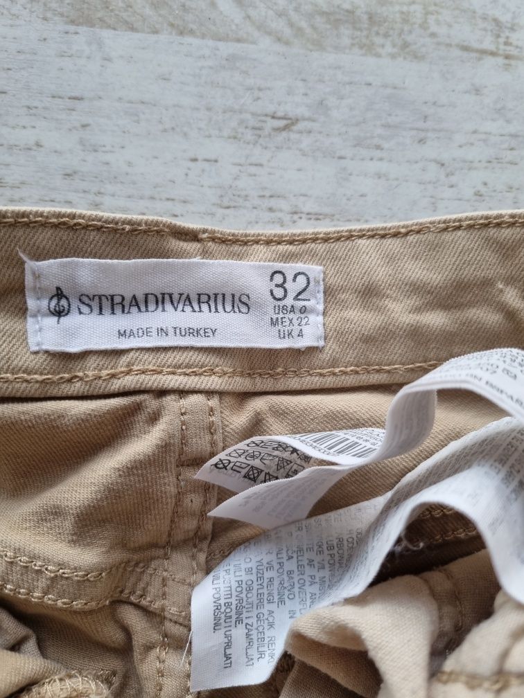 Spodnie bawełniane z wysokim stanem Stradivarius rozmiar 32