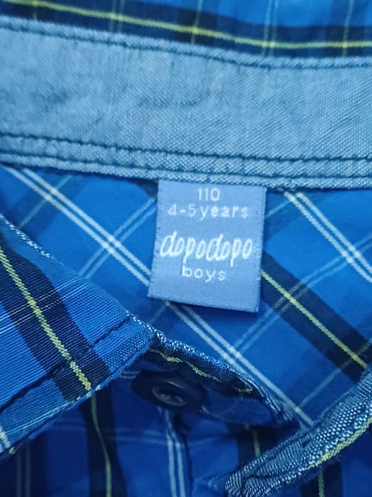 Dwie koszule w kratę dla bliźniaków jedna niebieska, druga zielona