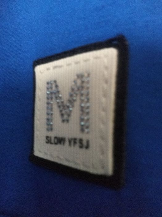 Nowy chabrowy garnitur damski z frędzlami