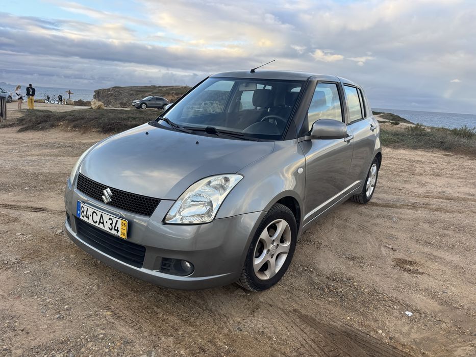 Suzuki Swift 2006 Automatico poucos kms 4.8 l/100 mto economico