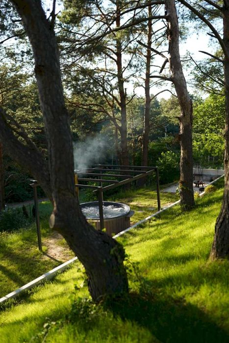 Dom w lesie pod Warszawą - balia  i sauna