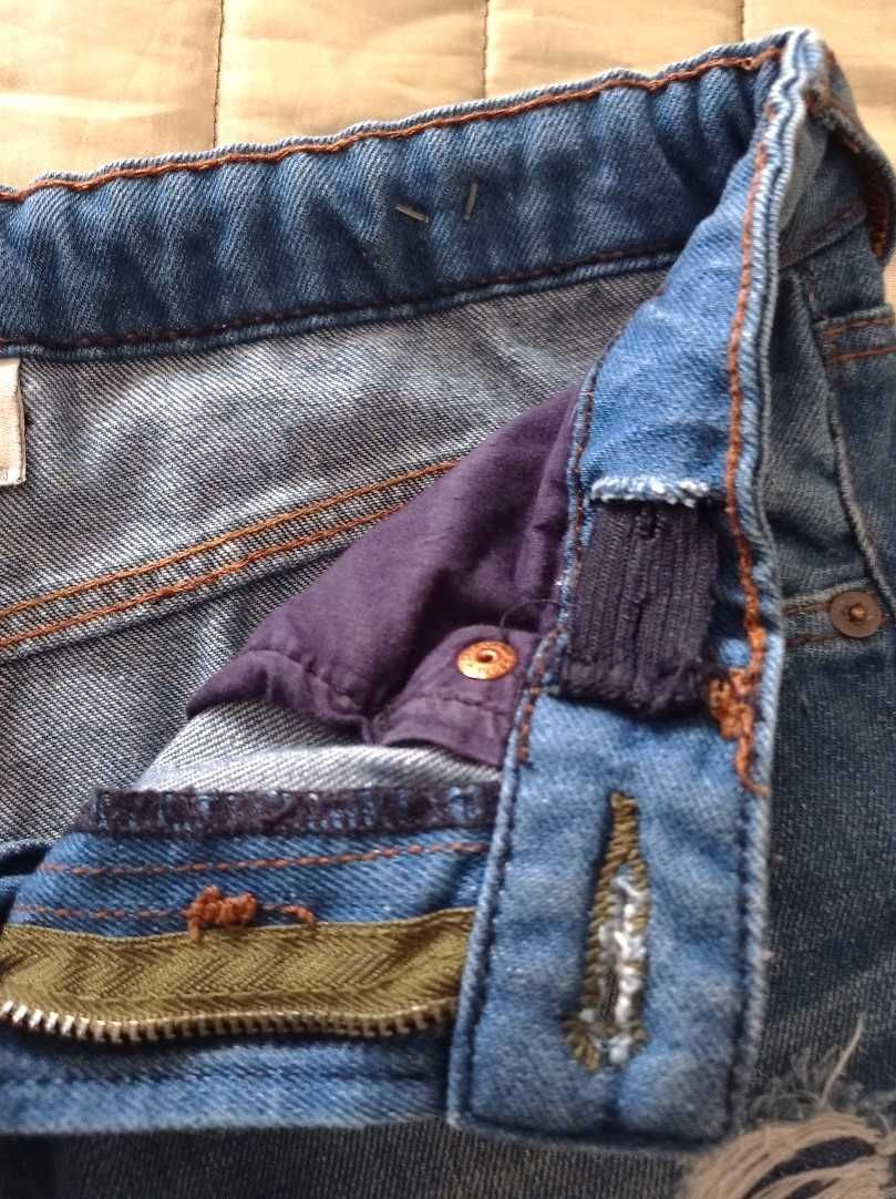 Jeans ganga. efeito deslavado e rasgões para rapaz Tam. 9/10 - Zara