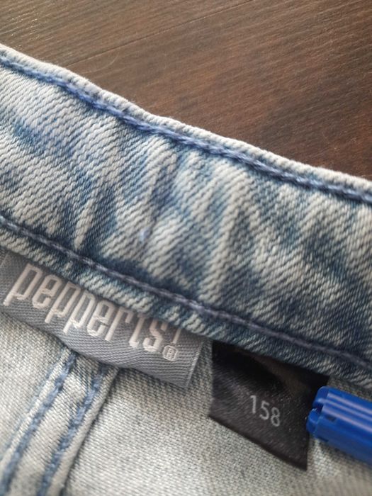 Dwie pary spodni jeansów marki H&M oraz Pepperts r. 158
