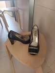 Sapatos de senhora usados