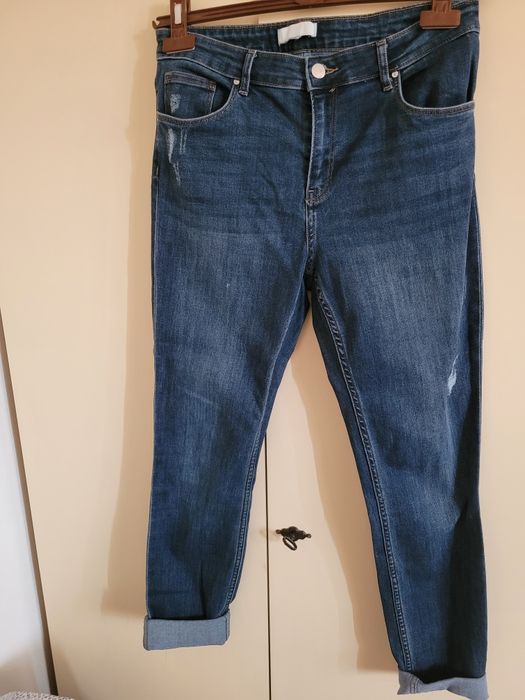 Jeansy H&M  wyższym stanem rozm.40-42 .42