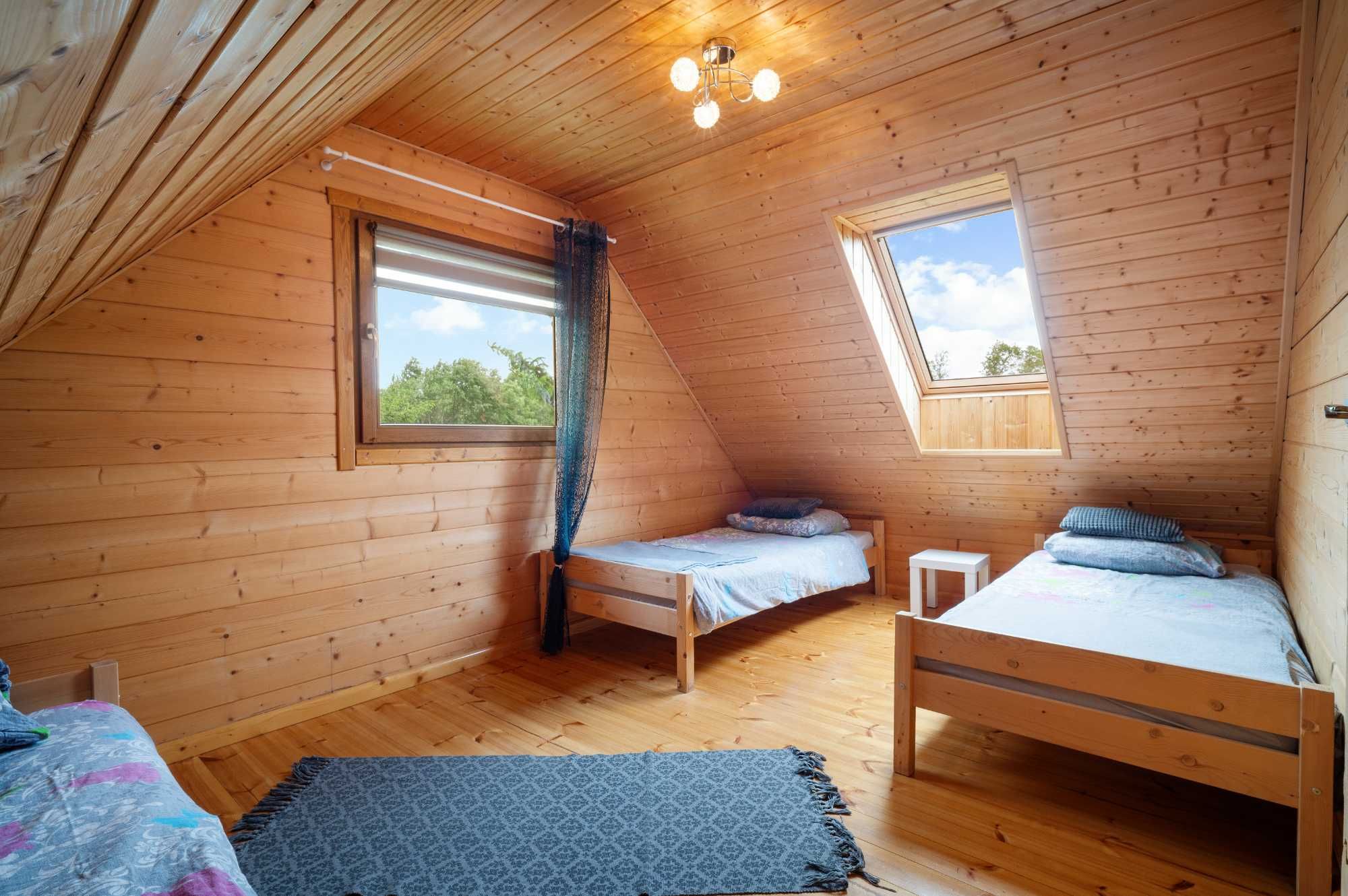 Domek 3 Mazury jacuzzi sauna łódka pomost quady