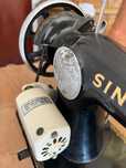Máquina de costura singer