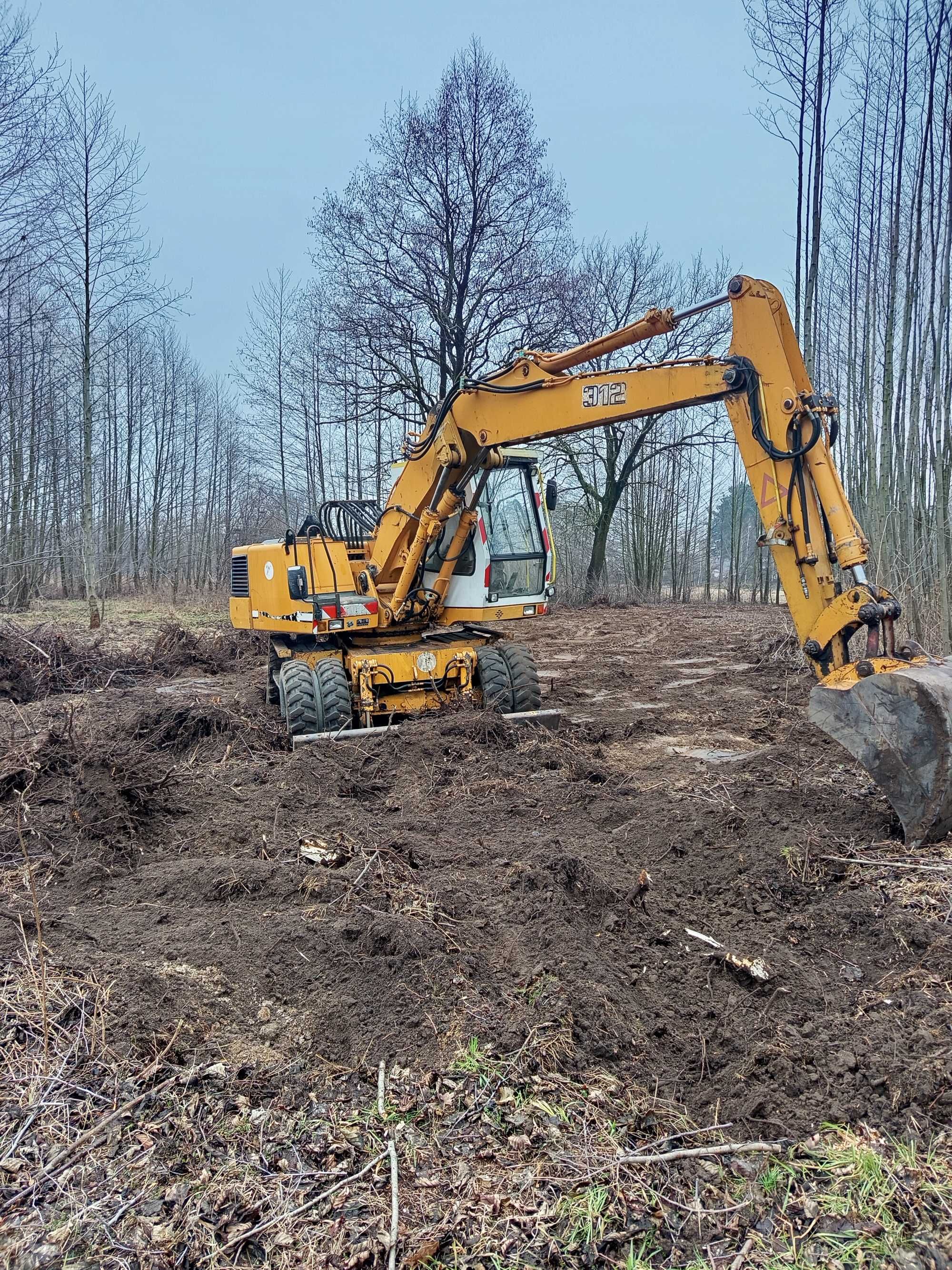 Roboty ziemne drogi wyburzenia kopanie stawów wywóz gruzu ziemi karp