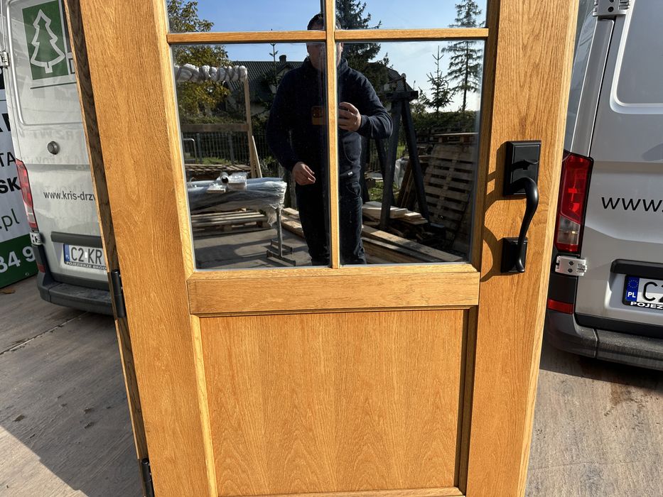 Drzwi zewnętrzne drewniane z klamką Schlage na wymiar Czyste powietrze