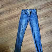 Spodnie levis damskie 25/32