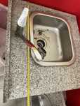 Bancada em granito com banca em inox