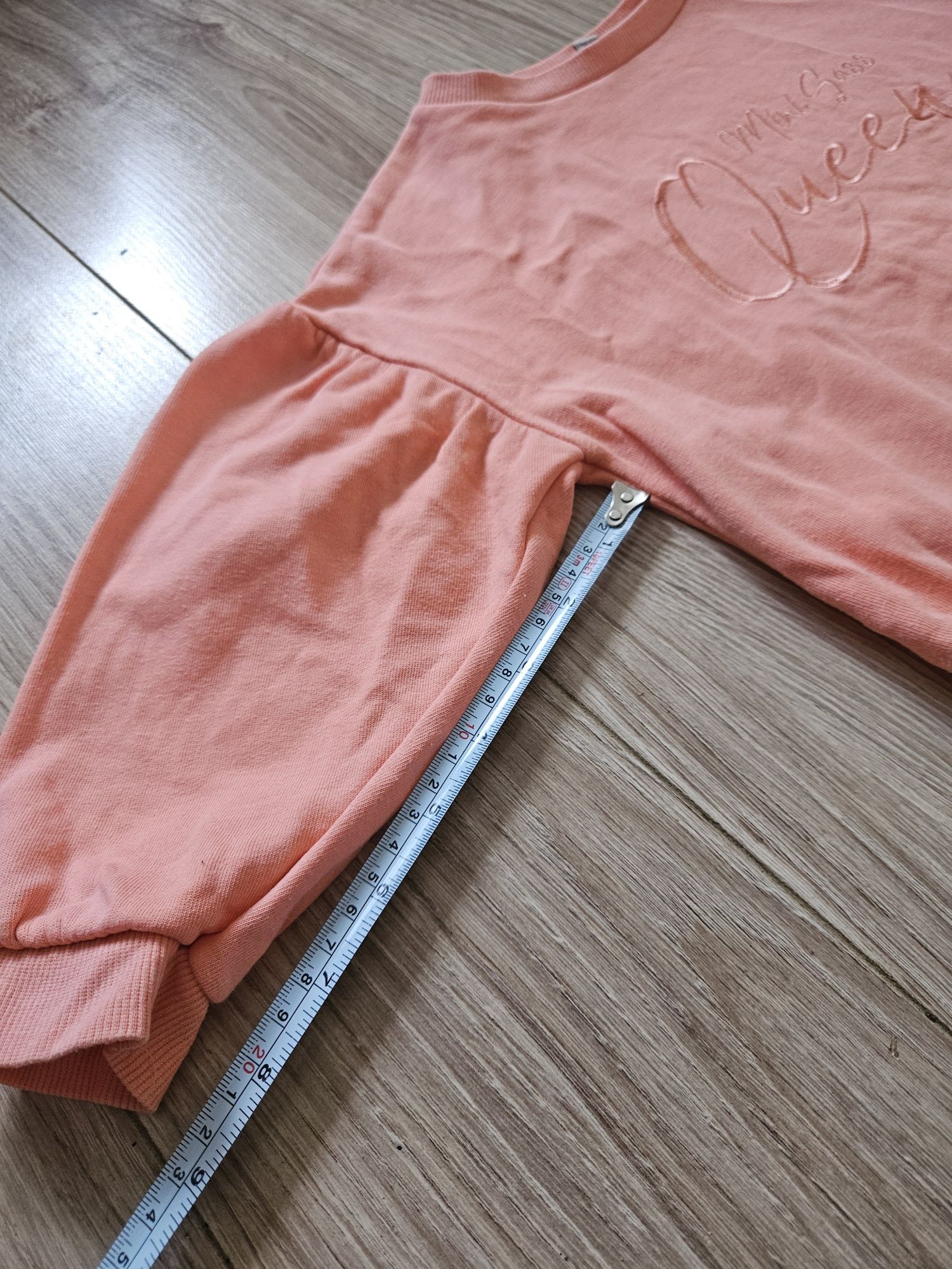 Bluza morelowa River island z bufiastymi rękawami napis sass Queen