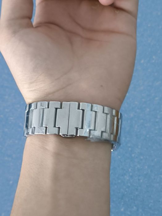 Годинник Tissot PRX, Patek Phillippe Nautilus.