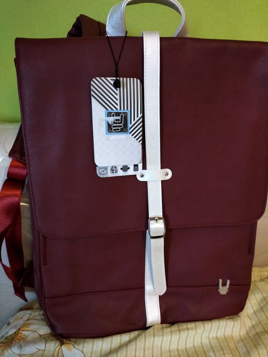 Mochilas em tecido /napa. NOVAS