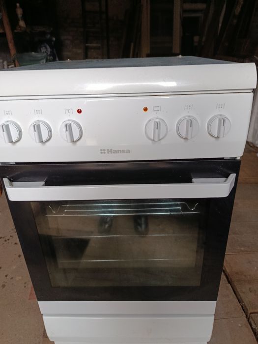 Продам комбинированную плиту Hansa