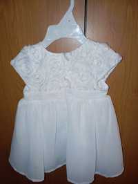 Biała sukienka 68