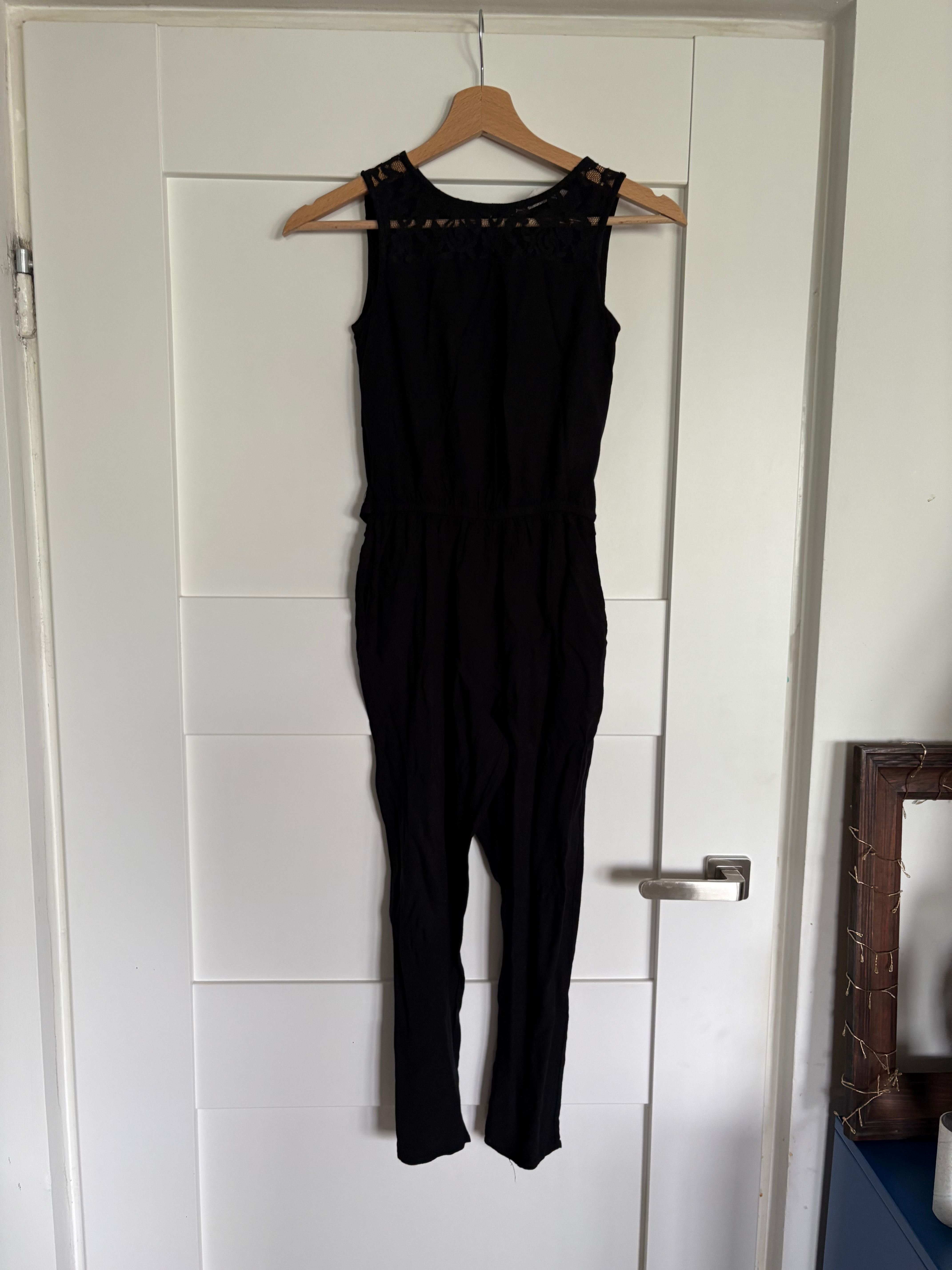 Czarny kombinezon koronka H&M r.134