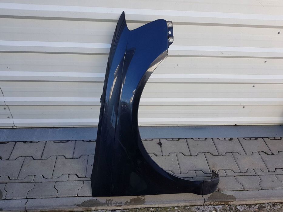 AUDI A3 8P LIFT 08-12r BŁOTNIK PRAWY PRZÓD LZ7L