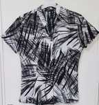 Camisa como nova