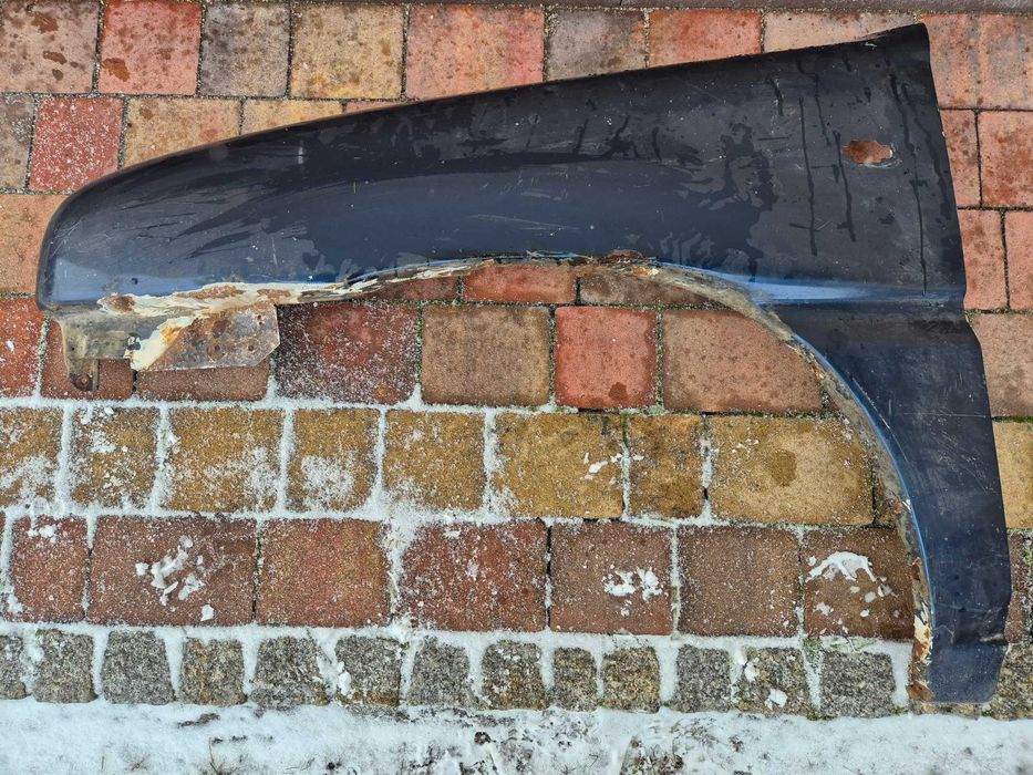 Nissan Terrano II 93-99 Ford Maverick błotnik lewy przód